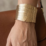 Bold adjustable statement kada in gold finish for festive and party wear