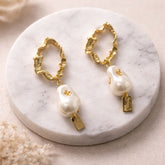 Elegant party wear pearl drop earrings with gold finish