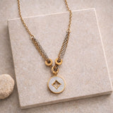 elegant layered chain necklace with geometric charm