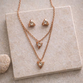 minimal triangle pendant necklace with matching triangle stud earrings