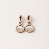 rose-gold-cat-eye-stone-drop-earrings-minimal-jewelry.jpg