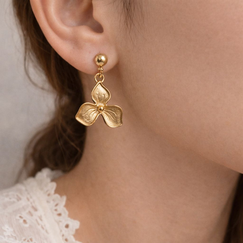 Stylish flower earrings gold textured design statement jewelry