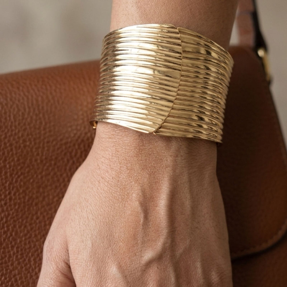 Bold adjustable statement kada in gold finish for festive and party wear