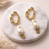 Elegant party wear pearl drop earrings with gold finish