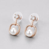 Lightweight pearl drop earrings for women with modern geometric design