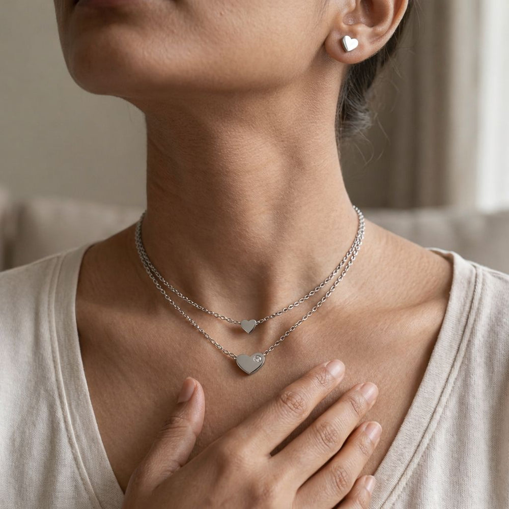 minimal heart pendant necklace with matching heart stud earrings