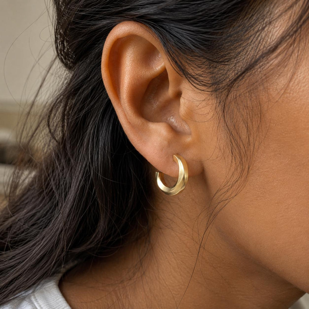 Minimal gold hoop earrings with premium lacquer shine and modern design