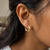 Minimal gold hoop earrings with premium lacquer shine and modern design