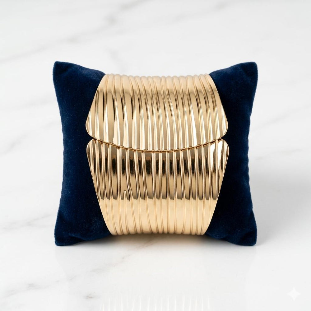 Wide gold cuff bracelet for women with adjustable fit and statement look